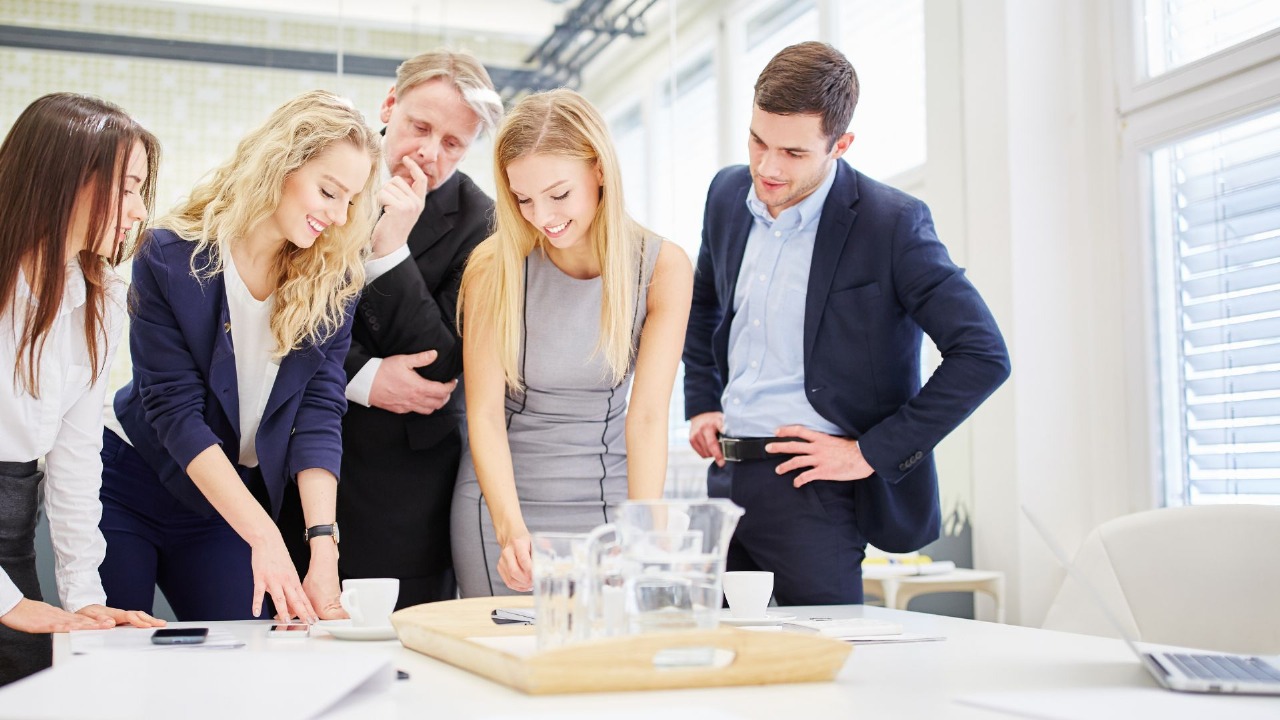 Businessperson analyzing data on digital dashboard